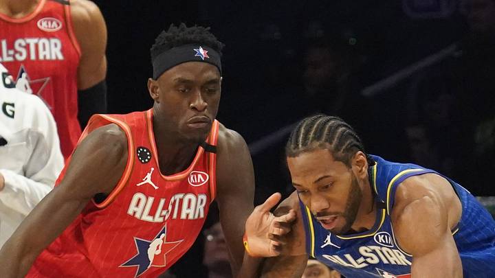 Team LeBron forward Kawhi Leonard chases the ball with Team Giannis forward Pascal Siakam. Team LeBron forward Kawhi Leonard chases the ball with Team Giannis forward Pascal Siakam.
