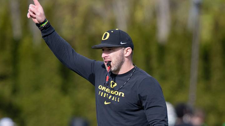 Oregon tight ends coach Drew Mehringer works with players during practice with the Ducks Thursday, April 11, 2024, at the Hatfield-Dowlin Complex in Eugene, Ore. Oregon tight ends coach Drew Mehringer works with players during practice with the Ducks Thursday, April 11, 2024, at the Hatfield-Dowlin Complex in Eugene, Ore.