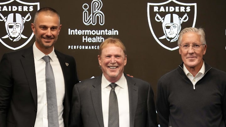 Jan 27, 2025; Las Vegas, NV, USA; Las Vegas Raiders general manager John Spytek (left), owner Mark Davis (center) and coach Pete Carroll pose at press conference at Intermountain Health Performance Center. Mandatory Credit: Kirby Lee-Imagn Images