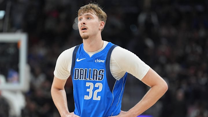 Feb 7, 2026; San Antonio, Texas, USA;  Dallas Mavericks forward Cooper Flagg (32) looks on in the first half against the San Antonio Spurs at Frost Bank Center. Mandatory Credit: Daniel Dunn-Imagn Images