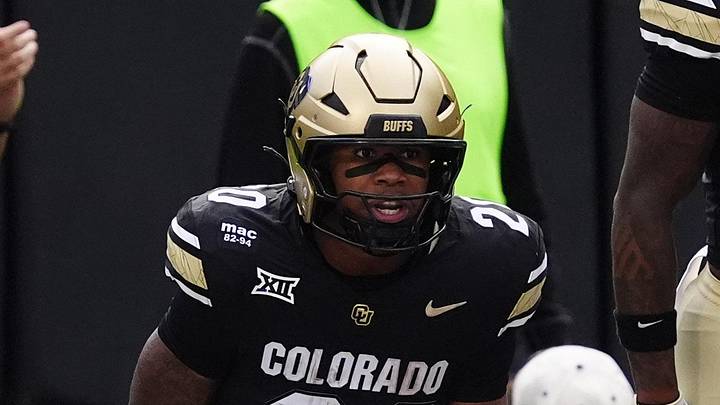 Aug 29, 2025; Boulder, Colorado, USA; Colorado Buffaloes running back Dekalon Taylor (20) celebrates his touchdown reception in the first quarter against the Georgia Tech Yellow Jackets at Folsom Field. Mandatory Credit: Ron Chenoy-Imagn Images