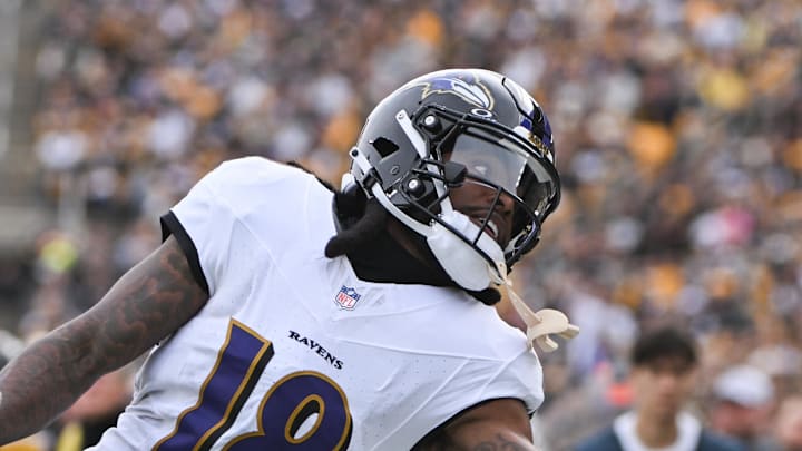 Nov 17, 2024; Pittsburgh, Pennsylvania, USA; Baltimore Ravens wide receiver Diontae Johnson (18) reaches for an incomplete pass against the Pittsburgh Steelers during the first quarter at Acrisure Stadium. Mandatory Credit: Barry Reeger-Imagn Images