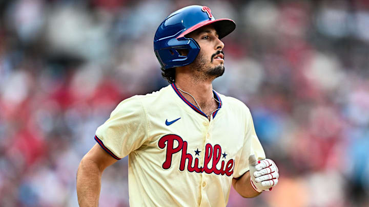 Jun 5, 2024; Philadelphia, Pennsylvania, USA; Philadelphia Phillies catcher Garrett Stubbs (21) advances to first on a walk against the Milwaukee Brewers in the fifth inning at Citizens Bank Park Jun 5, 2024; Philadelphia, Pennsylvania, USA; Philadelphia Phillies catcher Garrett Stubbs (21) advances to first on a walk against the Milwaukee Brewers in the fifth inning at Citizens Bank Park