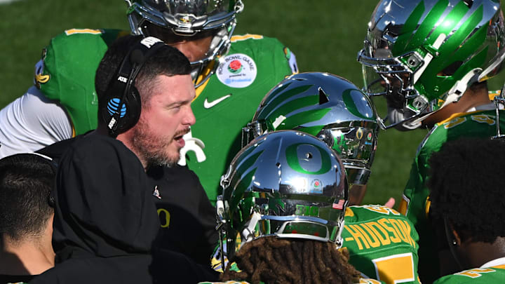 Jan 1, 2025; Pasadena, CA, USA; Oregon Ducks head coach Dan Lanning during a timeout in the first quarter against the Ohio State Buckeyes at Rose Bowl Stadium. Mandatory Credit: Robert Hanashiro-Imagn Images