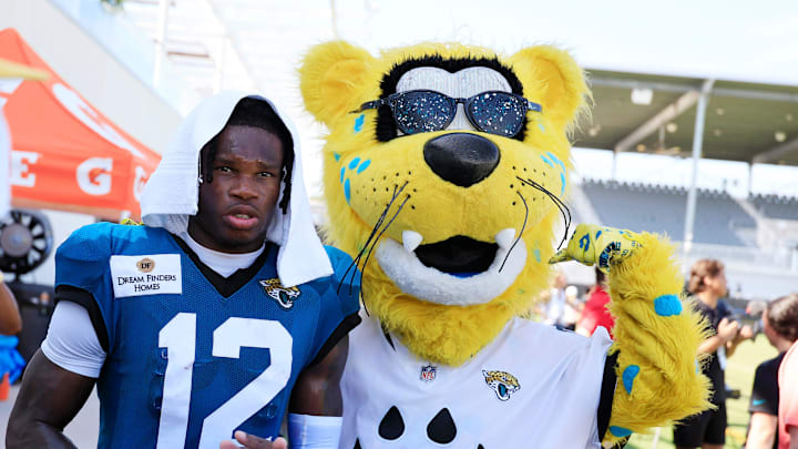Jacksonville Jaguars wide receiver Travis Hunter (12) is seen with team mascot Jaxson de Ville after an NFL training camp session at the Miller Electric Center, Tuesday, July 29, 2025, in Jacksonville, Fla. [Corey Perrine/Florida Times-Union]
