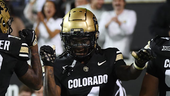 Sep 21, 2024; Boulder, Colorado, USA; Colorado Buffaloes wide receiver Omarion Miller (4) celebrates with teammates after a touchdown during the first half against the Baylor Bears at Folsom Field. Mandatory Credit: Christopher Hanewinckel-Imagn Images Sep 21, 2024; Boulder, Colorado, USA; Colorado Buffaloes wide receiver Omarion Miller (4) celebrates with teammates after a touchdown during the first half against the Baylor Bears at Folsom Field. Mandatory Credit: Christopher Hanewinckel-Imagn Images