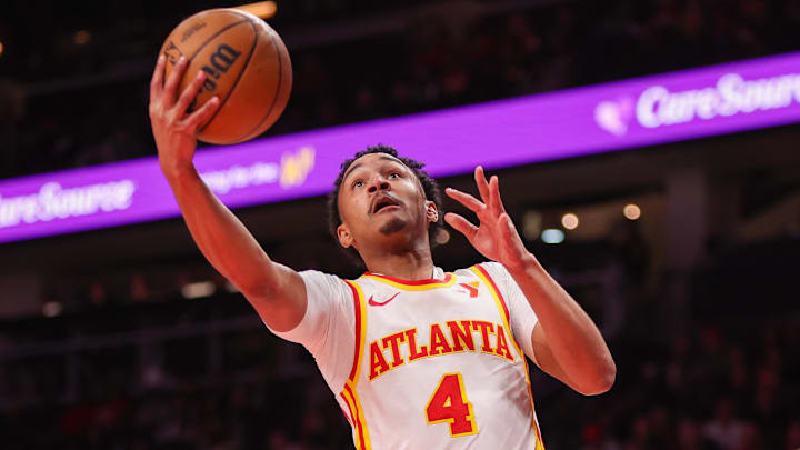 Atlanta Hawks guard Kobe Bufkin (4) shoots against the New Orleans Pelicans in the second quarter at State Farm Arena.