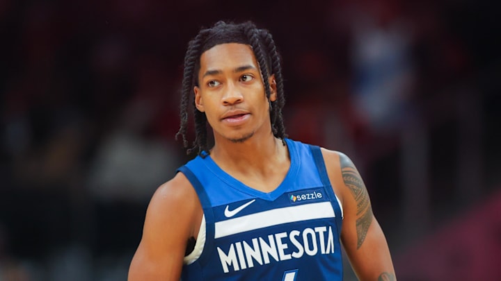 Dec 23, 2024; Atlanta, Georgia, USA; Minnesota Timberwolves guard Rob Dillingham (4) in action against the Atlanta Hawks in the fourth quarter at State Farm Arena. Mandatory Credit: Brett Davis-Imagn Images