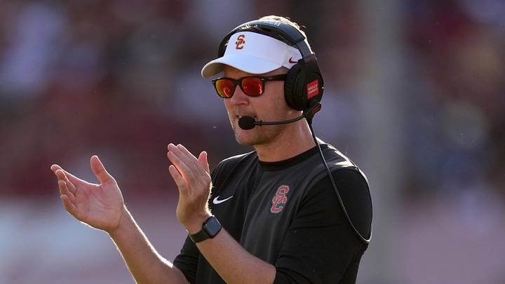 Aug 30, 2025; Los Angeles, California, USA; Southern California Trojans head coach Lincoln Riley watches from the sidelines against the Missouri State Bears in the first half at United Airlines Field at Los Angeles Memorial Coliseum. Mandatory Credit: Kirby Lee-Imagn Images