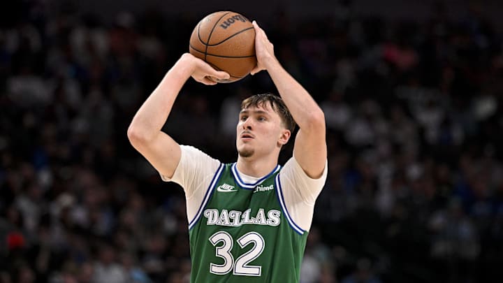 Oct 26, 2025; Dallas, Texas, USA; Dallas Mavericks forward Cooper Flagg (32) makes a three point shot against the Toronto Raptors during the second half at the American Airlines Center. Mandatory Credit: Jerome Miron-Imagn Images Oct 26, 2025; Dallas, Texas, USA; Dallas Mavericks forward Cooper Flagg (32) makes a three point shot against the Toronto Raptors during the second half at the American Airlines Center. Mandatory Credit: Jerome Miron-Imagn Images