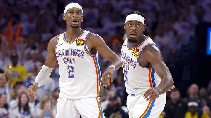 Jun 5, 2025; Oklahoma City, Oklahoma, USA; Oklahoma City Thunder guard Shai Gilgeous-Alexander (2) and guard Luguentz Dort (5) look on during the third quarter against the Indiana Pacers during game one of the 2025 NBA Finals at Paycom Center. Mandatory Credit: Alonzo Adams-Imagn Images Jun 5, 2025; Oklahoma City, Oklahoma, USA; Oklahoma City Thunder guard Shai Gilgeous-Alexander (2) and guard Luguentz Dort (5) look on during the third quarter against the Indiana Pacers during game one of the 2025 NBA Finals at Paycom Center. Mandatory Credit: Alonzo Adams-Imagn Images