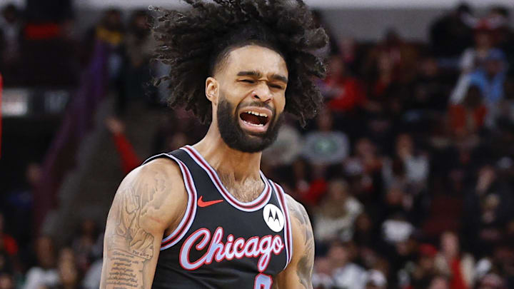Jan 24, 2026; Chicago, Illinois, USA; Chicago Bulls guard Coby White (0) reacts after scoring against the Boston Celtics during the first half at United Center. Mandatory Credit: Kamil Krzaczynski-Imagn Images