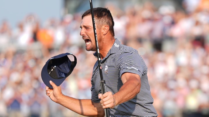 Former SMU golfer Bryson DeChambeau celebrates after putting on the eighteenth green to win the U.S. Open golf tournament on Sunday in Pinehurst, N.C.