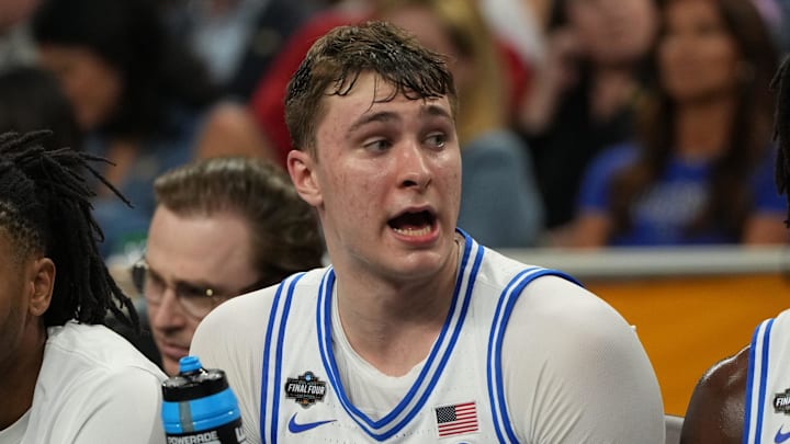 Apr 5, 2025; San Antonio, TX, USA; Duke Blue Devils forward Cooper Flagg (2) looks on from the bench against the Houston Cougars during the second half in the semifinals of the men's Final Four of the 2025 NCAA Tournament at the Alamodome. Mandatory Credit: Bob Donnan-Imagn Images