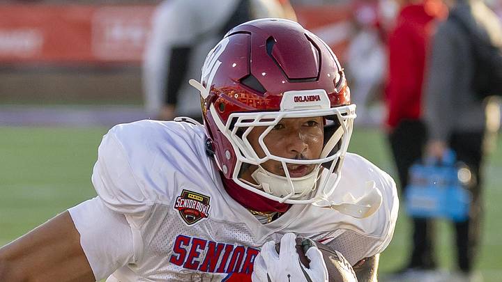 Jan 29, 2026; Mobile, AL, USA; American running back Jaydn Ott (8) of Oklahoma runs the ball during American Senior Bowl practice at Hancock Whitney Stadium. Mandatory Credit: Vasha Hunt-Imagn Images