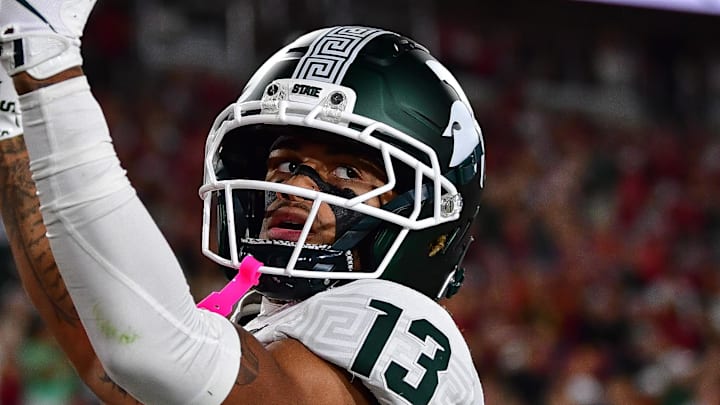 Sep 20, 2025; Los Angeles, California, USA; Michigan State Spartans wide receiver Chrishon McCray (13) celebrates his touchdown scored against the Southern California Trojans during the first half at the Los Angeles Memorial Coliseum.