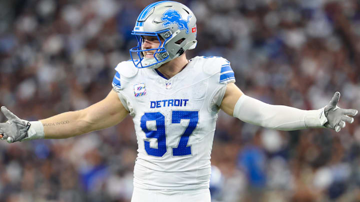 Oct 13, 2024; Arlington, Texas, USA; Detroit Lions defensive end Aidan Hutchinson (97) in action during the game against the Dallas Cowboys at AT&T Stadium. Mandatory Credit: Kevin Jairaj-Imagn Images