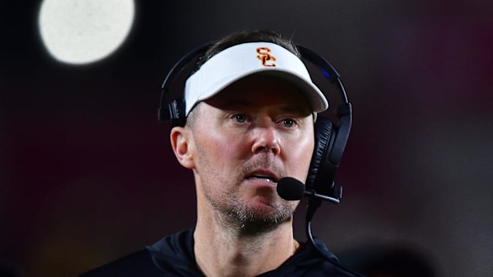 Nov 7, 2025; Los Angeles, California, USA; Southern California Trojans head coach Lincoln Riley watches game action against the Northwestern Wildcats during the second half at the Los Angeles Memorial Coliseum. Mandatory Credit: Gary A. Vasquez-Imagn Images