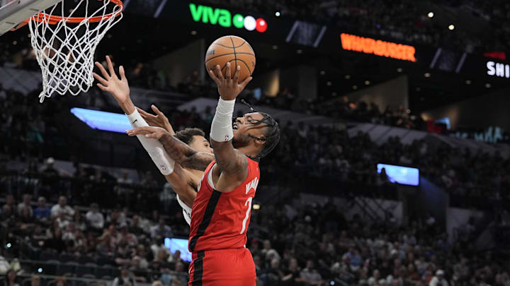 Oct 26, 2024; San Antonio, Texas, USA;  Houston Rockets forward Cam Whitmore (7) shoots the ball in the first half against the San Antonio Spurs at Frost Bank Center. Mandatory Credit: Daniel Dunn-Imagn Images