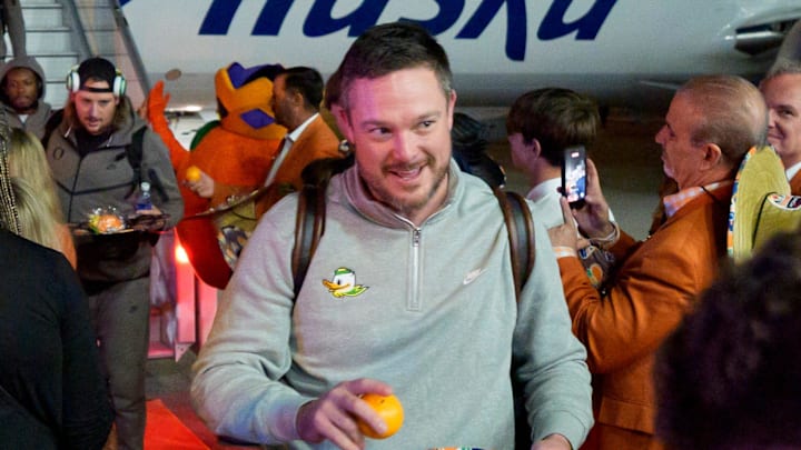 Oregon head coach Dan Lanning walks off the plane as the Oregon Ducks arrive at Miami International Airport ahead of the Orange Bowl on Dec. 29, 2025, in Miami, Florida.