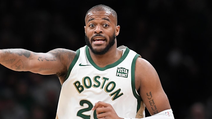 Apr 7, 2024; Boston, Massachusetts, USA; Boston Celtics forward Xavier Tillman Sr. (26) reacts to game action against the Portland Trail Blazers during the second half at TD Garden. Mandatory Credit: Eric Canha-Imagn Images
