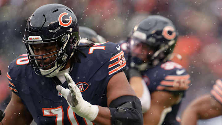 Dec 31, 2023; Chicago, Illinois, USA;  Chicago Bears offensive lineman Braxton Jones (70) blocks against the Atlanta Falcons at Soldier Field. Mandatory Credit: Jamie Sabau-Imagn Images