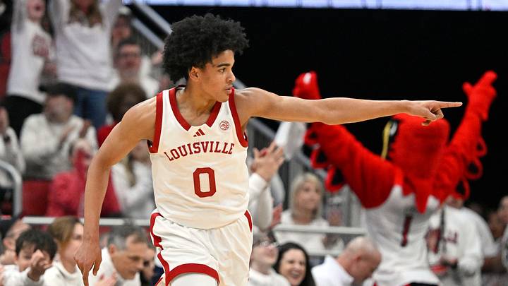 Feb 9, 2026; Louisville, Kentucky, USA; Louisville Cardinals guard Mikel Brown Jr. (0) reacts after making a shot against the NC State Wolfpack during the first half at KFC Yum! Center. Mandatory Credit: Jamie Rhodes-Imagn Images Feb 9, 2026; Louisville, Kentucky, USA; Louisville Cardinals guard Mikel Brown Jr. (0) reacts after making a shot against the NC State Wolfpack during the first half at KFC Yum! Center. Mandatory Credit: Jamie Rhodes-Imagn Images