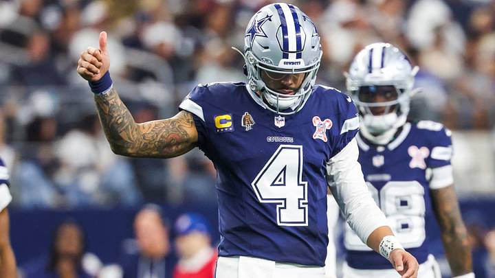 Dallas Cowboys quarterback Dak Prescott signals towards the sideline following a play against the Los Angeles Chargers.