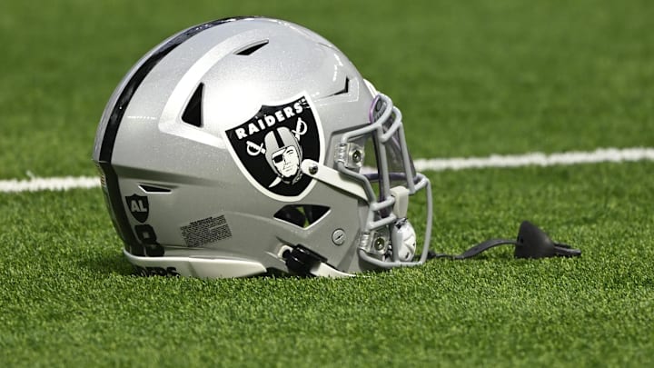 Oct 20, 2024; Inglewood, California, USA; Las Vegas Raiders helmet on the turn at SoFi Stadium during pregame warmups before an NFL game against the Los Angeles Rams. Mandatory Credit: Robert Hanashiro-Imagn Images