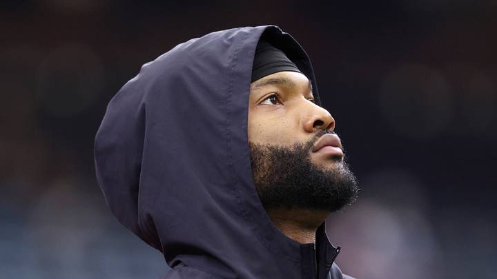 Houston Texans wide receiver Nico Collins warms up