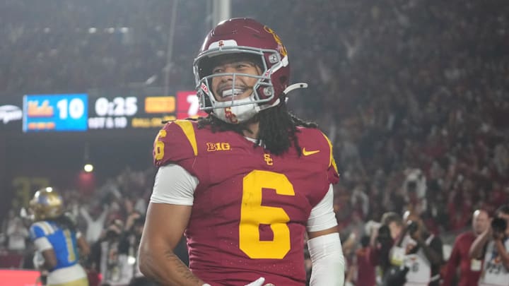 Nov 29, 2025; Los Angeles, California, USA; Southern California Trojans wide receiver Makai Lemon (6) celebrates after catching a 32-yard touchdown pass against the UCLA Bruins in the second half at United Airlines Field at Los Angeles Memorial Coliseum. Mandatory Credit: Kirby Lee-Imagn Images Nov 29, 2025; Los Angeles, California, USA; Southern California Trojans wide receiver Makai Lemon (6) celebrates after catching a 32-yard touchdown pass against the UCLA Bruins in the second half at United Airlines Field at Los Angeles Memorial Coliseum. Mandatory Credit: Kirby Lee-Imagn Images