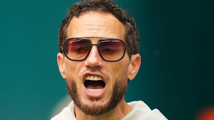 Miami Dolphins head coach Mike McDaniel stands on the field prior to a game against the New Orleans Saints 