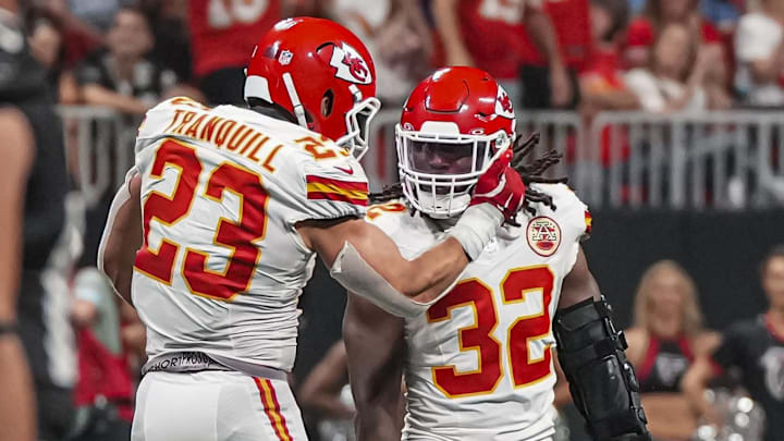 Sep 22, 2024; Atlanta, Georgia, USA; Kansas City Chiefs linebacker Drue Tranquill (23) and linebacker Nick Bolton (32) react after the Chiefs stopped the Atlanta Falcons on fourth down during the second half at Mercedes-Benz Stadium. Mandatory Credit: Dale Zanine-Imagn Images Sep 22, 2024; Atlanta, Georgia, USA; Kansas City Chiefs linebacker Drue Tranquill (23) and linebacker Nick Bolton (32) react after the Chiefs stopped the Atlanta Falcons on fourth down during the second half at Mercedes-Benz Stadium. Mandatory Credit: Dale Zanine-Imagn Images
