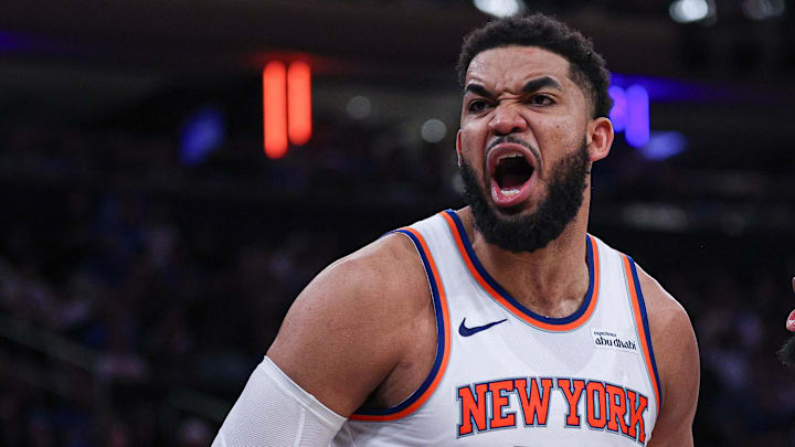 Apr 18, 2026; New York, New York, USA; New York Knicks center Karl-Anthony Towns (32) reacts during the fourth quarter of the 2026 NBA Playoffs against the Atlanta Hawks at Madison Square Garden. Mandatory Credit: Vincent Carchietta-Imagn Images