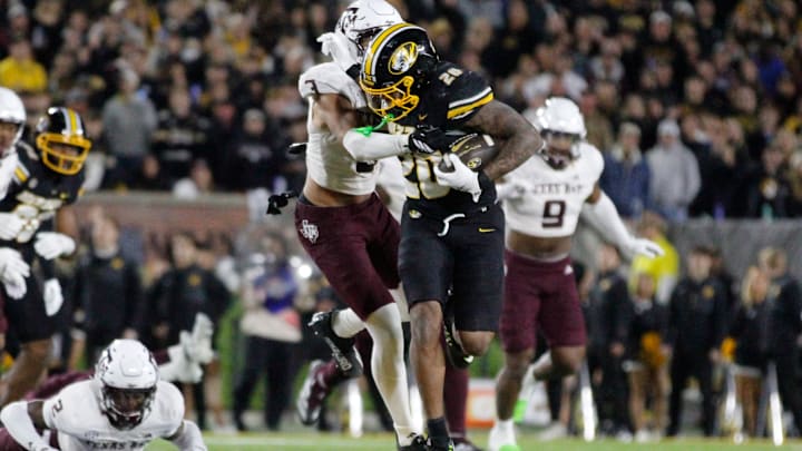 Nov 8, 2025; Columbia, Missouri, USA; Missouri Tigers running back Jamal Roberts rushes in the Missouri matchup against Texas A&M at Faurot Field.