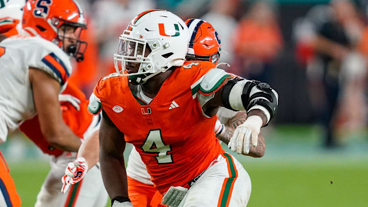 Nov 8, 2025; Miami Gardens, Florida, USA; Miami Hurricanes defensive lineman Rueben Bain Jr. (4) rushes the passer against the Syracuse Orange during the third quarter at Hard Rock Stadium. Mandatory Credit: Jeff Romance-Imagn Images