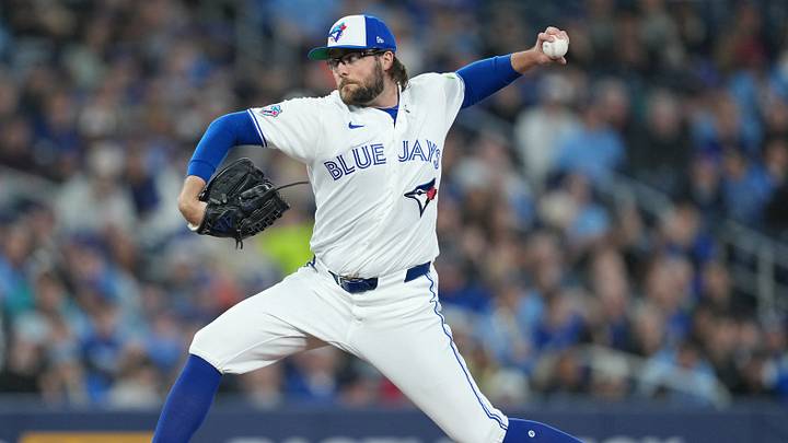 Apr 6, 2026; Toronto, Ontario, CAN; Toronto Blue Jays relief pitcher Josh Fleming (26) throws a pitch against the Los Angeles Dodgers during the third inning at Rogers Centre. Mandatory Credit: Nick Turchiaro-Imagn Images