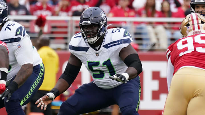 Nov 17, 2024; Santa Clara, California, USA; Seattle Seahawks center Olu Oluwatimi (51) blocks San Francisco 49ers defensive tackle Sam Okuayinonu (91) in the second quarter at Levi's Stadium. Mandatory Credit: David Gonzales-Imagn Images