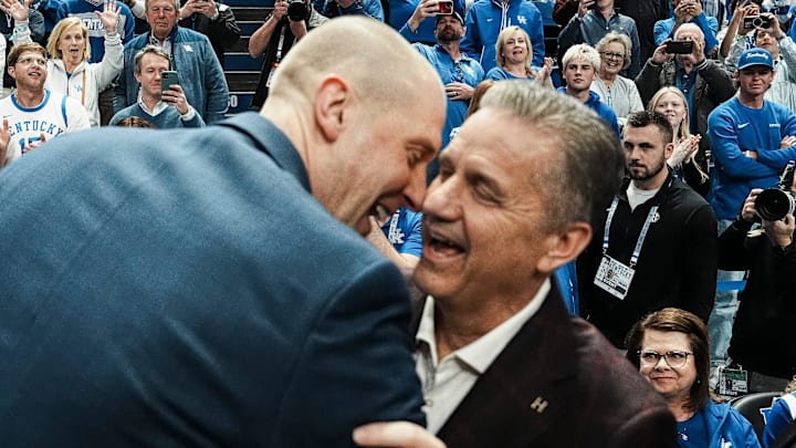 Former UK coach and current Arkansas coach John Calipari hugs Kentucky coach Mark Pope before the game Saturday Feb. 1, 2025 at Rupp Arena in Lexington, Kentucky.