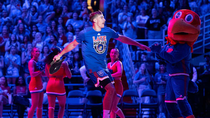 Kohl Rosario (7) throws a cowboy hat into the crowd during Late Night in the Phog, Friday, Oct. 17, 2025 at Allen Fieldhouse . Kohl Rosario (7) throws a cowboy hat into the crowd during Late Night in the Phog, Friday, Oct. 17, 2025 at Allen Fieldhouse .
