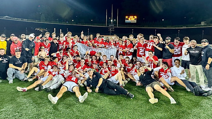 In the first overtime game in MIA lacrosse championship history, Calvert Hall came from behind to knock off Archbishop Spalding, the nation's No. 1 team, 10-9, Friday night at Towson University's Johnny Unitas Stadium.