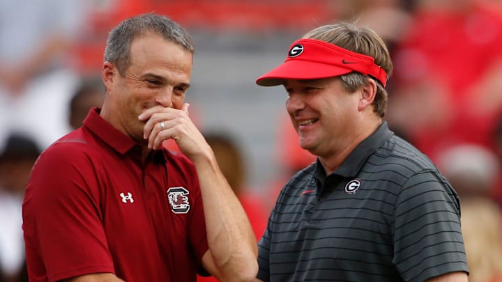 Sep 18, 2021; Athens, Georgia, USA; Georgia Bulldogs coach Kirby Smart (right) and South Carolina Gamecocks head coach Shane Beamer (left) speak before kickoff at Sanford Stadium. Mandatory Credit: Joshua L. Jones/Athens Banner-Herald via USA TODAY NETWORK

Ncaa Football South Carolina At Georgia