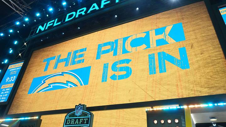 Apr 24, 2025; Green Bay, WI, USA; The Los Angeles Chargers logo is projected on the video board during the NFL Draft at Lambeau Field. Mandatory Credit: Kirby Lee-Imagn Images