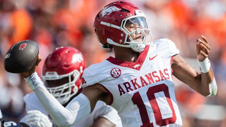 Arkansas Razorbacks quarterback Taylen Green throws a pass against the Auburn Tigers. Arkansas won the game 24-14, Arkansas Razorbacks quarterback Taylen Green throws a pass against the Auburn Tigers. Arkansas won the game 24-14,