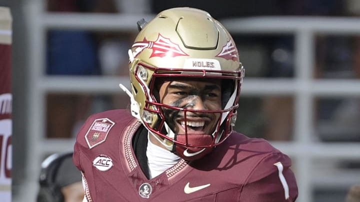 Aug 30, 2025; Tallahassee, Florida, USA; Florida State Seminoles quarterback Tommy Castellanos (1) celebrates with wide receiver Micahi Danzy (19) after a touchdown against the Alabama Crimson Tide during the second half at Doak S. Campbell Stadium. Mandatory Credit: Melina Myers-Imagn Images