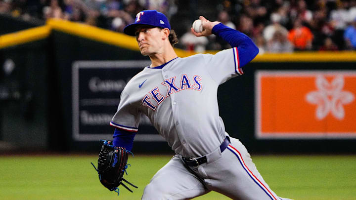 Texas Rangers pitcher Jacob Latz (67) pitches in the third inning of the game between Arizona Diamondbacks and Texas Rangers at Chase Field.