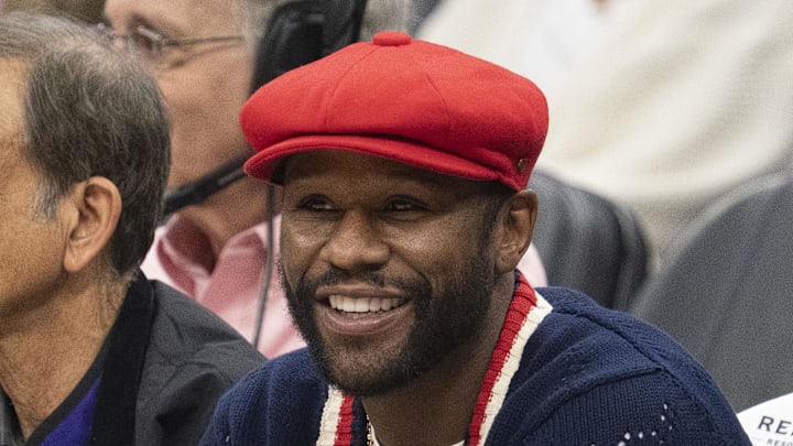 April 17, 2023; Sacramento, California, USA; Professional boxer Floyd Mayweather Jr. sits courtside during the first quarter in game two of the first round of the 2023 NBA playoffs between the Sacramento Kings and the Golden State Warriors at Golden 1 Center. Mandatory Credit: Kyle Terada-Imagn Images