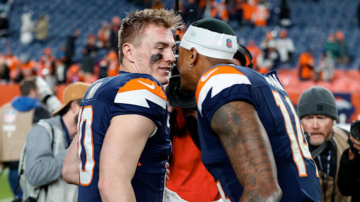 Dec 2, 2024; Denver, Colorado, USA; Denver Broncos quarterback Bo Nix (10) and wide receiver Courtland Sutton (14) after the game against the Cleveland Browns at Empower Field at Mile High. Mandatory Credit: Isaiah J. Downing-Imagn Images