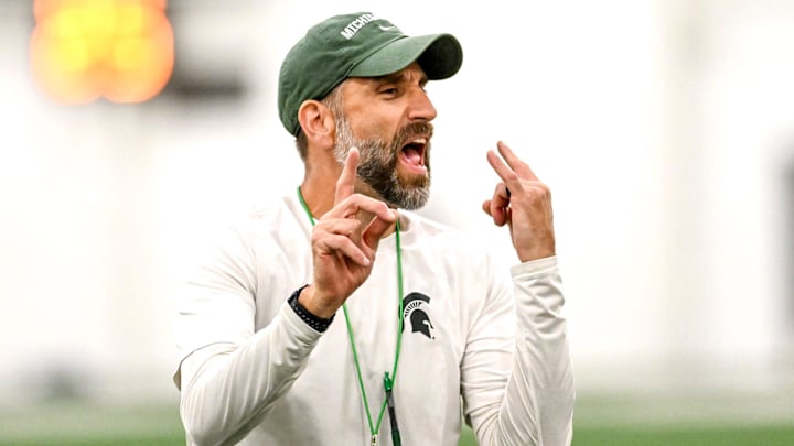 Michigan State's defensive coordinator Joe Rossi gives instructions while working with linebackers during camp on Monday, Aug. 5, 2024, at the indoor practice facility in East Lansing.