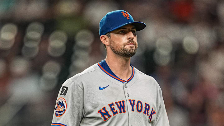 Aug 23, 2025; Cumberland, Georgia, USA; New York Mets starting pitcher Clay Holmes (35) leaves the field after being removed from the game against the Atlanta Braves during the seventh inning at Truist Park. Mandatory Credit: Dale Zanine-Imagn Images